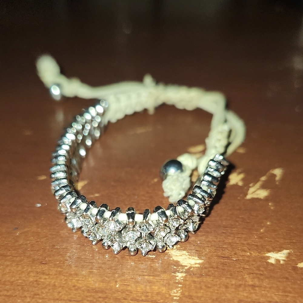 Elegant Silver and Cream Bracelet
